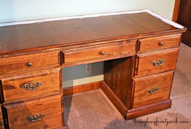 A roll top desk with the roll top removed.
