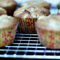 Apple muffins on a cooling rack.