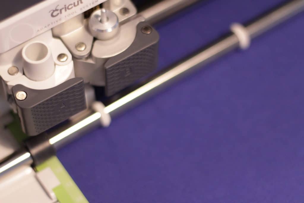 Cricut Maker cutting words for wreath.