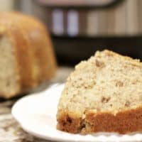 A slice of banana bread on a plate.