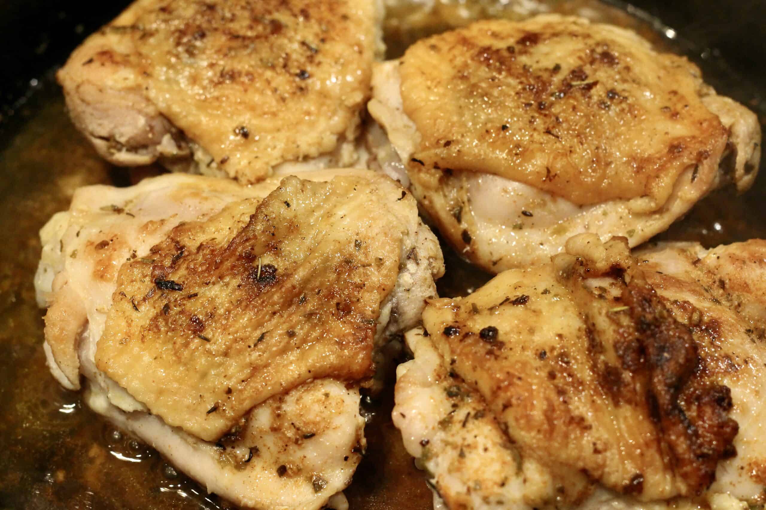 Fried chicken in a pan.